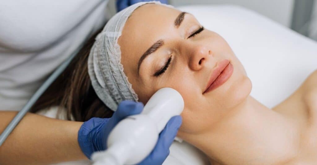 woman getting microneedling procedure